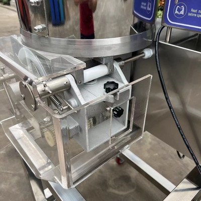 カスタマイズされた蒸しハンバーガーパティ模造プレスマシンのための電気肉磨機